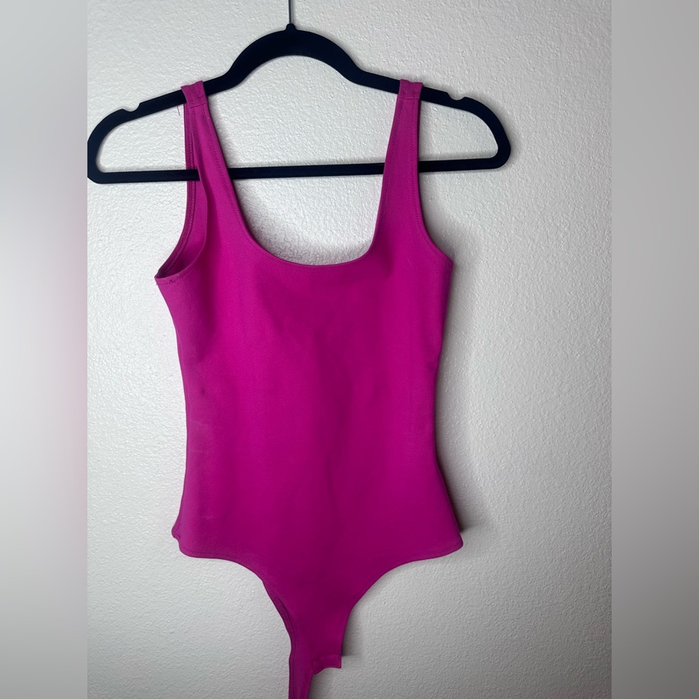 Purple seamless bodysuit with keyhole back detail
